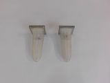 two knives on a white surface with a white background