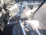 a car that has been damaged and is sitting in the back of the car