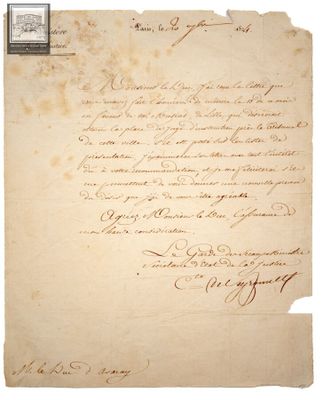 un bout de papier sur lequel figurent des inscriptions et un cachet