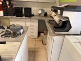 an image of a kitchen with a lot of clutter