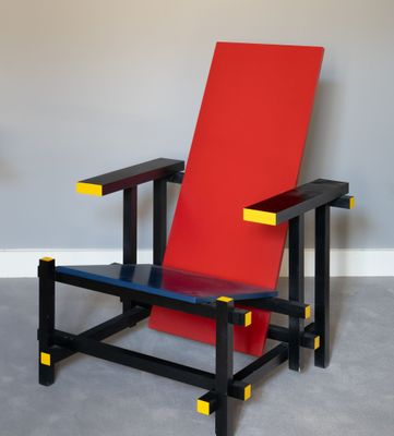 an image of a red and black chair in a room