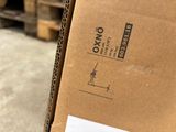 a cardboard box that is sitting on a pallet