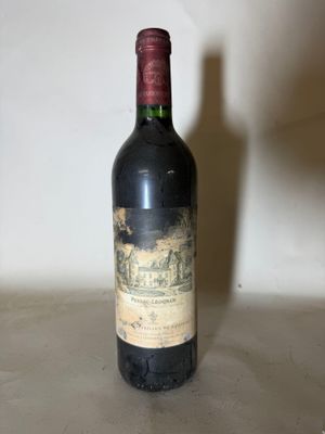 a bottle of wine that is sitting on a table
