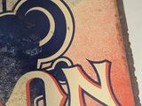 a sign with a picture of a mickey mouse on it