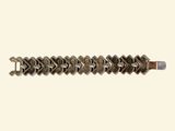 an image of a metal bracelet with an arrow design