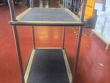 an image of a metal trolley in a warehouse
