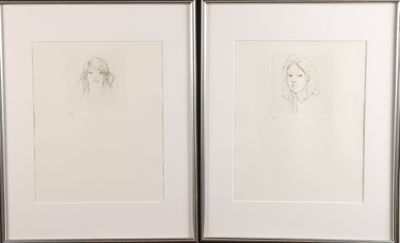 deux dessins encadrés représentant le visage d'une femme et celui d'un homme