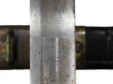 a close up of a knife with a handle on it