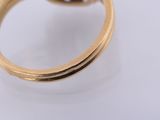 an image of a close up of a gold ring with a diamond