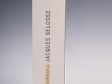 a white box with a gold logo on it