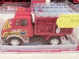 a red fire truck with a yellow sticker on it