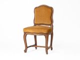 an image of a wooden chair with a yellow upholstered seat