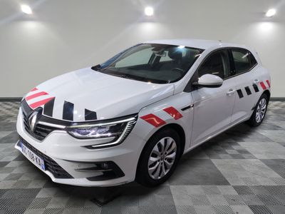 a white car with red and white stripes parked in a garage