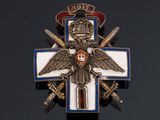 an image of a cross with two swords and an eagle on it