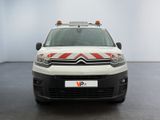 citroen van parked in a white room with a red and white stripe on the front of the van