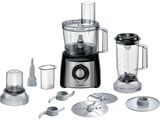 a picture of a blender with a lot of food in it
