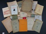 a lot of old books that are on the table