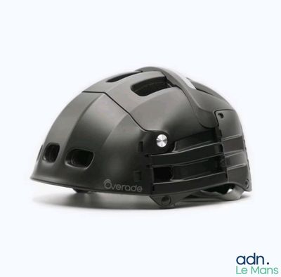 a helmet that is sitting on a white surface