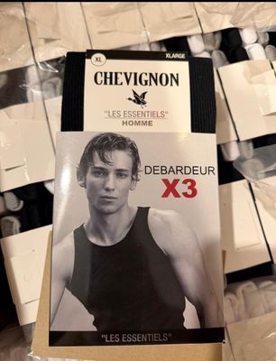 a box of cigarettes with a picture of a man in a tank top