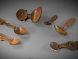 a lot of wooden objects that are on a table