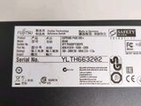 a close up of the back of a laptop with a label on it