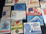 many different types of advertising posters on the table