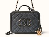 a chanel black quilted leather handbag with gold hardware