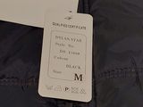 a label on the back of a jacket that is attached to it