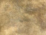 a large piece of waxed paper on a black surface