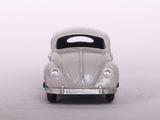 a toy car that is sitting on a white surface