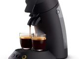 an image of a black coffee maker with two cups of coffee