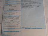 a sheet of paper on a table with a calculator and a calculator on it