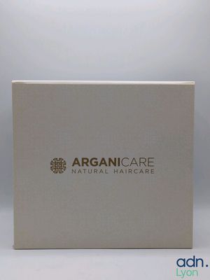 a white box with a logo on it sitting on top of a table