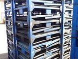 a lot of trays that are sitting on the ground