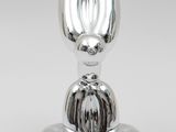 a silver object that is sitting on top of a table