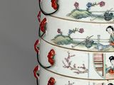 a white box with asian designs on it on a table