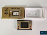 a small electronic device that is sitting next to a box