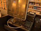 an image of a cash register in a grocery store
