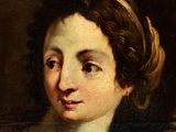 portrait of a woman in a brown dress with a headband