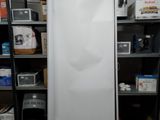 an image of a white refrigerator in a room