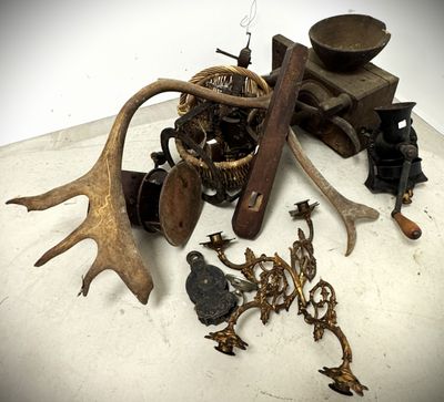a pile of old metal items on a table