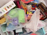 a bag full of toys and other items in it