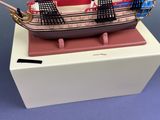 a small model of a pirate ship on a box