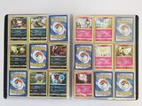 a lot of pokemon cards that are on the table