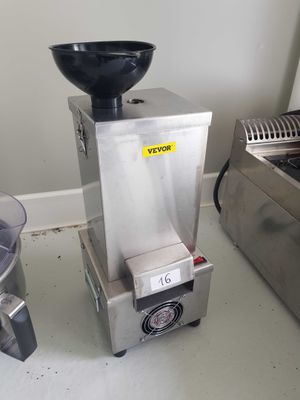 une machine surmontée d'un bol