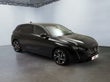 an image of a black car in a showroom