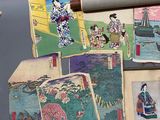 a lot of old books that are sitting on a table