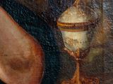 an oil painting of a man with a beard and a hat next to a bowl of fruit