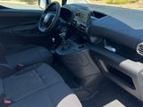 the interior of a car with the front seats folded down and the driver ' s seat folded down