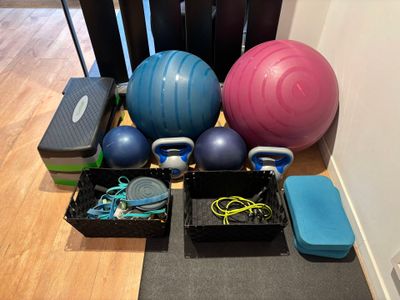 many different types of exercise equipment on the floor